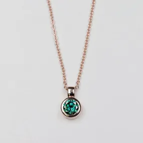 Round Bezel Set Pendant with Green Moissanite